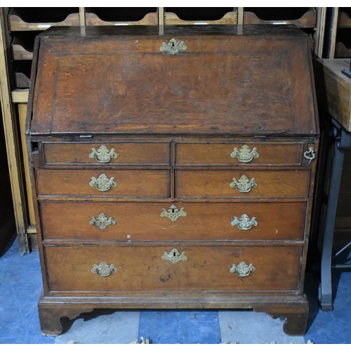 465 - A George III Crossbanded Oak Fall Front Bureau with Fitted Interior and Well, Secret Compartments, P... 