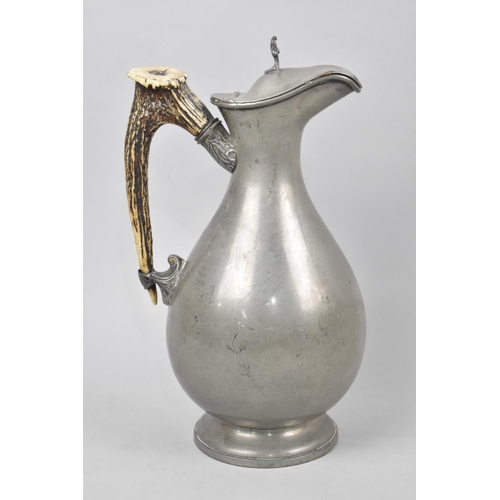 48 - A Pewter Lidded Jug with Antler Handle by James Dixon and Sons, Sheffield, 26cms High
