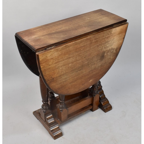 495 - An Edwardian Mahogany Drop Leaf Occasional Table, 61cm wide