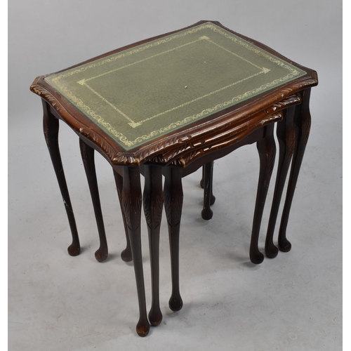 496 - A Mahogany Framed Nest of Three Table with Tooled Leather Tops