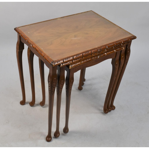 497 - A Mid 20th Century Mahogany Nest of Three Table