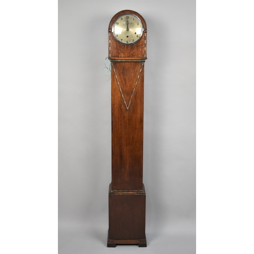 65 - An Edwardian Oak Cased Grandmother Clock with Westminster Chime Movement, 131cms High, with Key and ... 