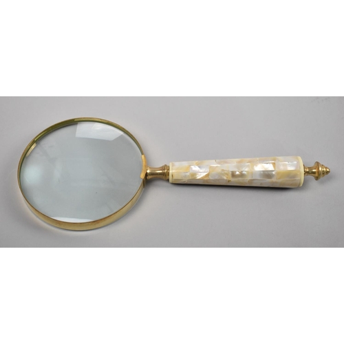 77 - A Brass and Mother of Pearl Handled Desk Top Magnifying Glass, 25cms Long