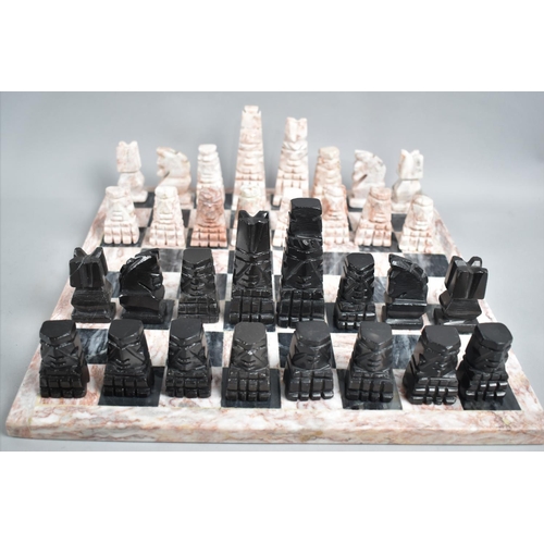 85 - A Reconstituted Marble Chess Set, Board 36cms Square