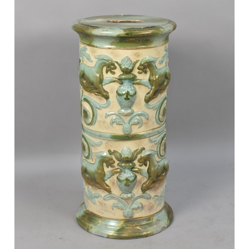 87 - A Late 19th/Early 20th century Majolica Glazed Cylindrical Seat, Decorated in relief with Stylised L... 