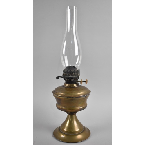 95 - An Early 20th Century Brass Oil Lamp, with Glass Chimney