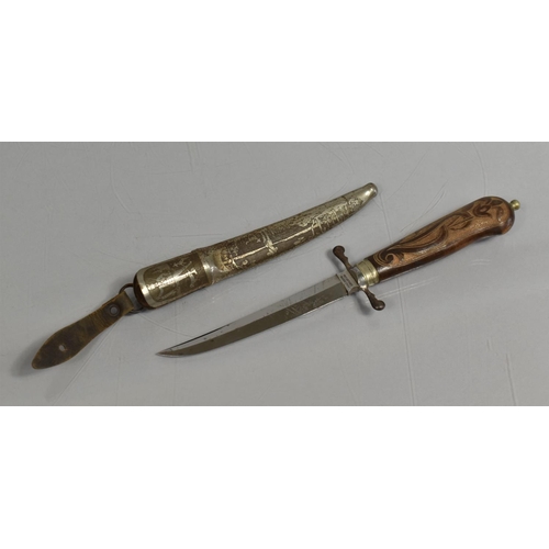 89 - A Vintage Swedish Hunting Knife complete with Scabbard, The Knife having Carved Wooden Handle and In... 