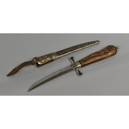 89 - A Vintage Swedish Hunting Knife complete with Scabbard, The Knife having Carved Wooden Handle and In... 