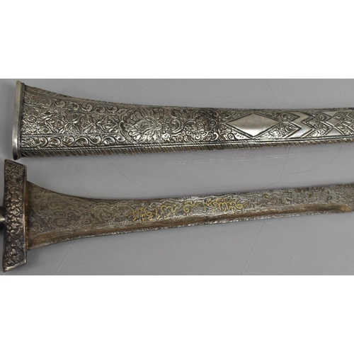 93 - A 19th Century Indonesian Kris and Scabbard having Silver Plated Mounts and Scabbard with Embossed F... 