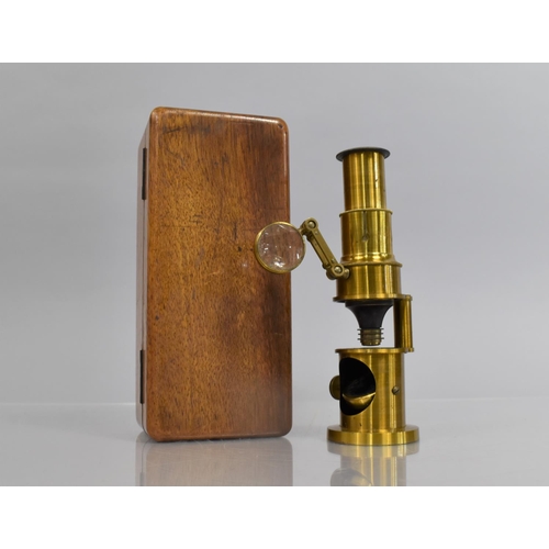 62 - A Brass Field Microscope Housed in Wooden Fitted Case, 14cms high and Case 16.5x7.5x5.5cms