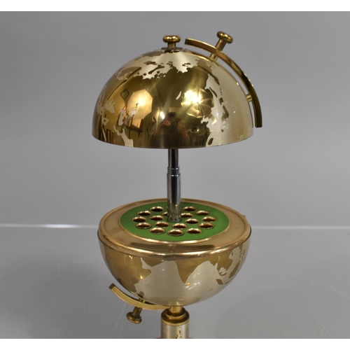 53 - A Mid 20th Century Novelty Desktop Cigarette Dispenser in the Form of a Globe, Splitting and the Equ... 