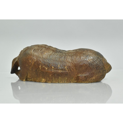 41 - A Black Forest Carved Wooden Study of Recumbent Hound, 23cms Long, with Loss