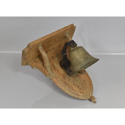 79 - An Early 20th Century Servants Bell Mounted on an Oak Plaque, 32x30cms