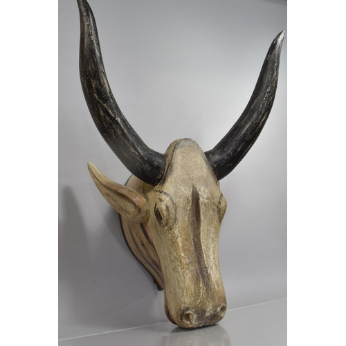 75 - An Indian Folk Art Carved Wood Cow's Head with Original Polychrome Painted Decoration, 45x40x85cms H... 