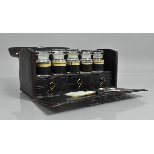 1 - A Late 19th Century Leather Travelling Medicine Case which Opens to Reveal Five Bottles Over Six Sma... 