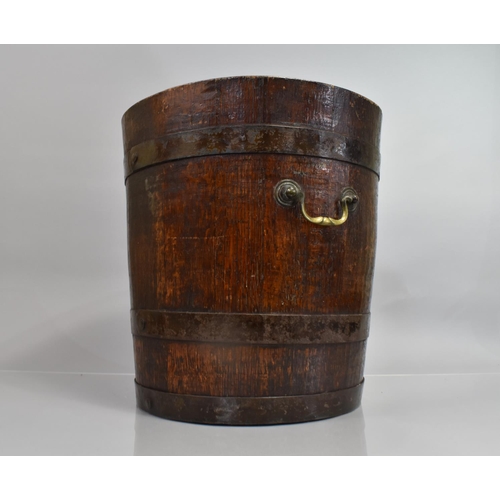 8 - A Coopered Oak Peat Bucket with Brass Bands and Twin Drop Handles, 38cms high