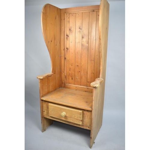 67 - A 19th century Pine Lambing Chair with Base Drawer and High Wing Back