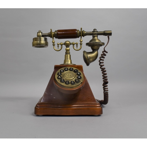 100 - A Mid 20th Century Reproduction Vintage Style Telephone with Push Button Numerals, 27cms High