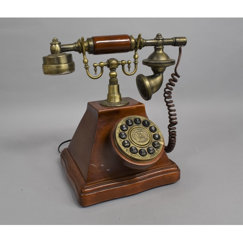 100 - A Mid 20th Century Reproduction Vintage Style Telephone with Push Button Numerals, 27cms High