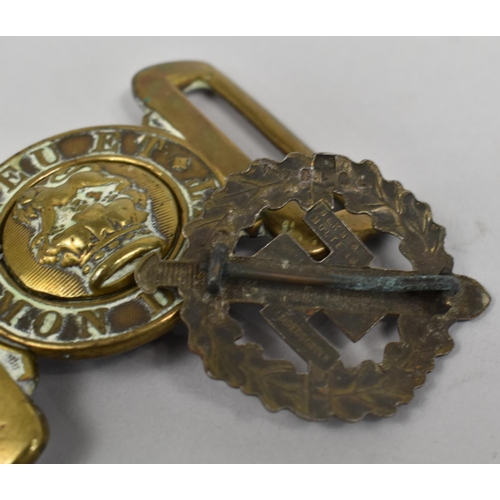 109 - A Brass Military Belt Buckle, Dieu et Mon Droit, together with a Nazi SA Sports Badge