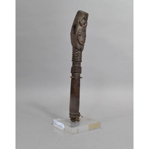 144 - A Carved African Tribal Relic on Museum Style Stand, 28cms High