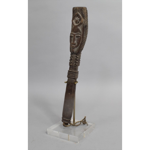 144 - A Carved African Tribal Relic on Museum Style Stand, 28cms High