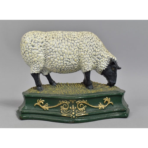 157 - A Reproduction Painted Cast Iron Doorstop in the Form of a Suffolk Ram, 29cms Wide