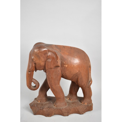 158 - A Large Carved Wooden African Study of an Elephant, 31cms High