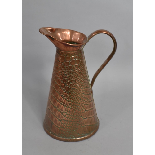 17 - A Hand Beaten Copper Ewer by Sankey, 29cms High