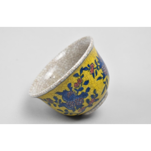 250 - A Modern Chinese Crackle Glaze Teabowl, Floral Motif Design in Blue and Pink on Yellow Ground, Six C... 