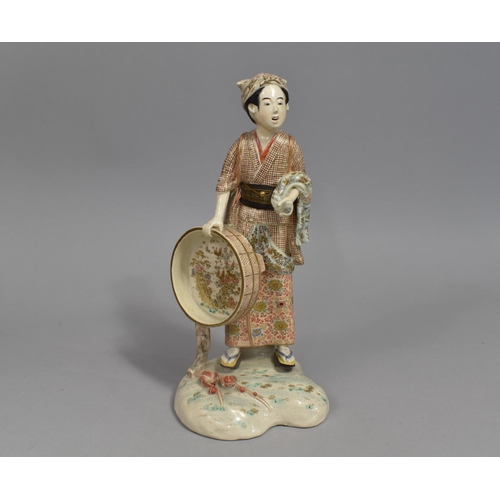 256 - A Japanese Satsuma Porcelain Figure, Maiden Labourer with Banded Bucket in Hand, 25cm high