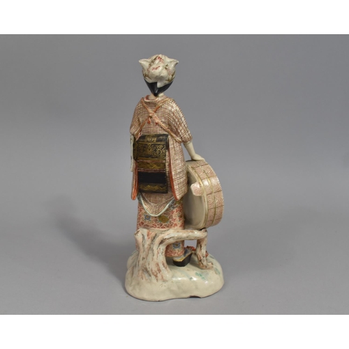 256 - A Japanese Satsuma Porcelain Figure, Maiden Labourer with Banded Bucket in Hand, 25cm high