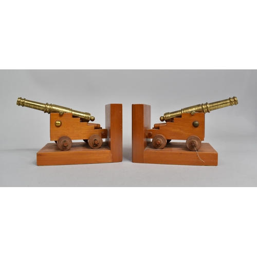 36 - A Pair of Novelty Bookends in the Form of Brass Mounted Cannons, 14cms Long