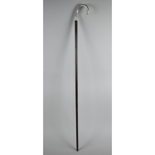 4 - A French Walking Stick with Silver Handle Decorated in relief with Orchids and Ribbons