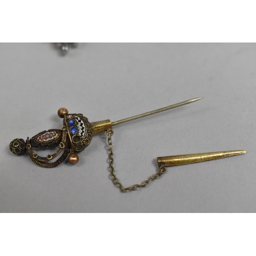 435 - A Collection of Three Continental Brooches, A Silver Italian Crucifix and a Continental Sword Pin