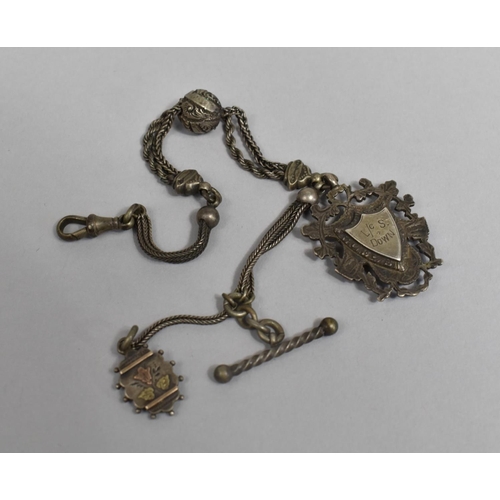 438 - An Edwardian Royal Welsh Fusiliers Gold and Silver Fob Dated 1910 together with Two Watch Chains