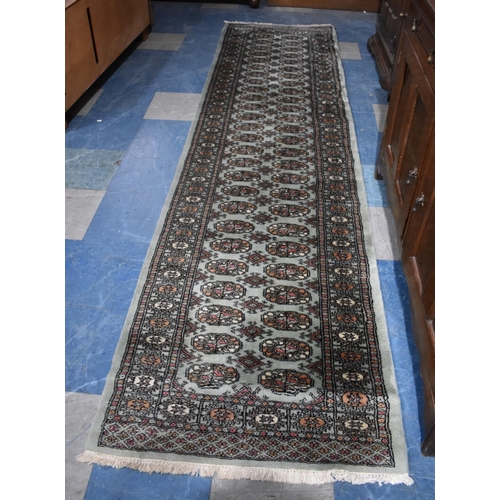 523 - A Mid 20th Century Patterned Woollen Runner, 310x82cms