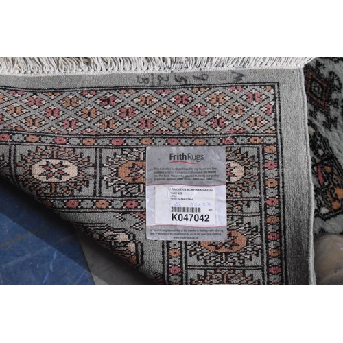 523 - A Mid 20th Century Patterned Woollen Runner, 310x82cms