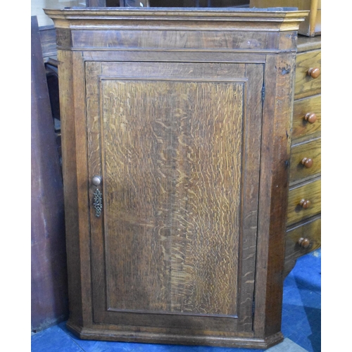 539 - A 19th Century Oak Wall hanging Corner Cabinet with Three Inner Shaped Shelves, 83cms Wide