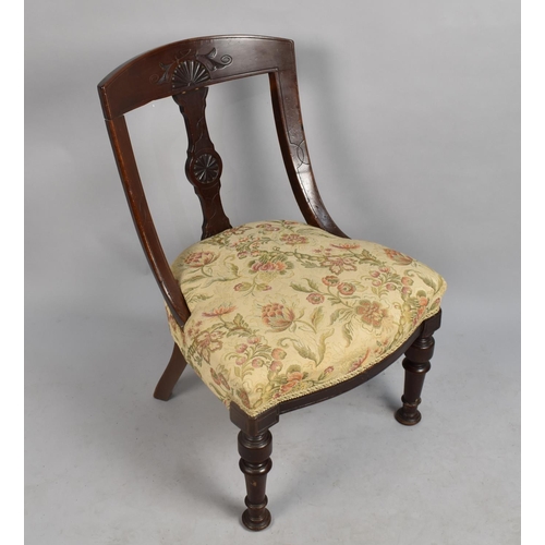 550 - An Edwardian Mahogany Framed Nursing Chair