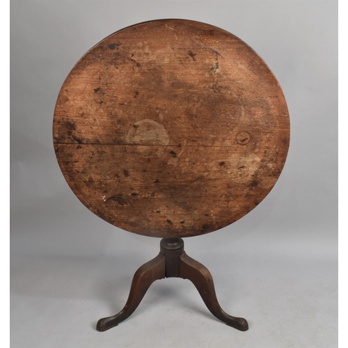 552 - A 19th Century Circular Snap Top Tripod Table, 84cms Diameter