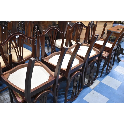 564 - A Set of Eight Mahogany Framed Shield Back Dining Chairs with Regency Striped Seats