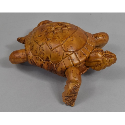 57 - A Far Eastern Carved Wooden Study of a Tortoise, 22cms Wide