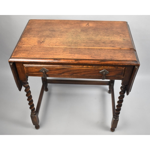 66 - An Edwardian Oak Side Table with Single Drawer and Drop Leaf Ends, Barley Twist Supports, 69cms Wide