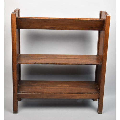 70 - An Edwardian Oak two Shelf Bookcase with Book Trough Top, 68cms Wide