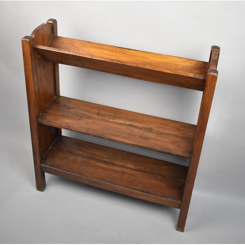 70 - An Edwardian Oak two Shelf Bookcase with Book Trough Top, 68cms Wide