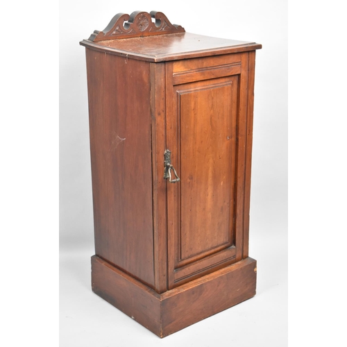 73 - An Edwardian Mahogany Bedside Cabinet with Panelled Door to Hinged Interior, Swan Neck Cornice, 36cm... 