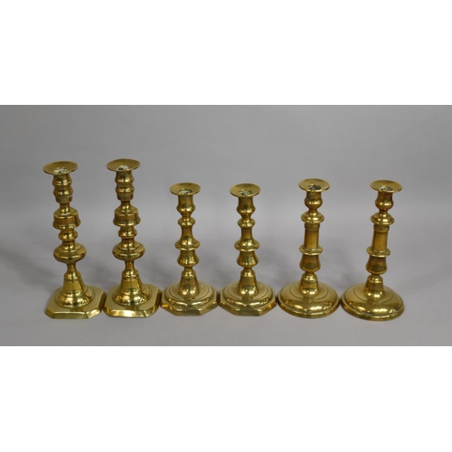 91 - A Collection of Three Pairs of Victorian Brass Candlesticks All with Pushers, Tallest 25cms High