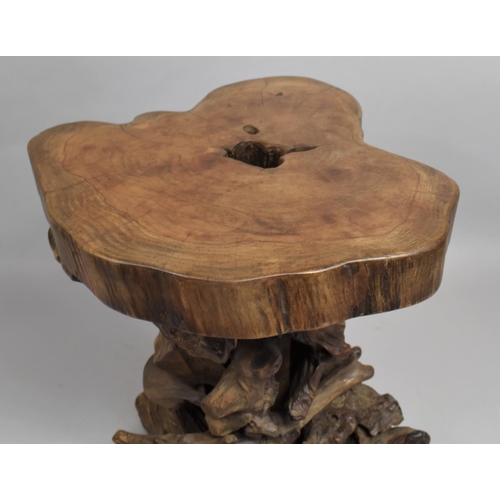 120 - An Early 20th Century French Grape Vine Table with a Solid Top over Twisted Natural Vine Support, 38... 