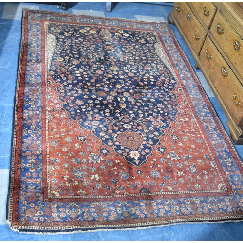 520 - An Antique Patterned Persian Rug, 264x132cms